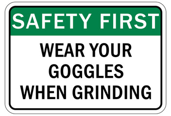 Protective equipment sign and labels wear your goggles when grinding