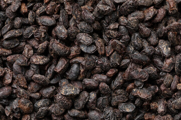 Chinese salted black beans close up full frame as background