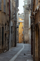 Fototapeta na wymiar Narrow alley in City of Grasse, France