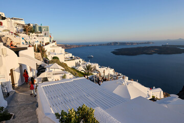 Whitewashed houses with terraces and pools and a beautiful view in Imerovigli on Santorini island, Greece