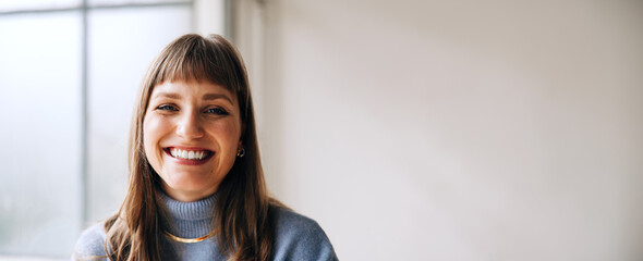 Portrait of a cheerful businesswoman smiling at the camera