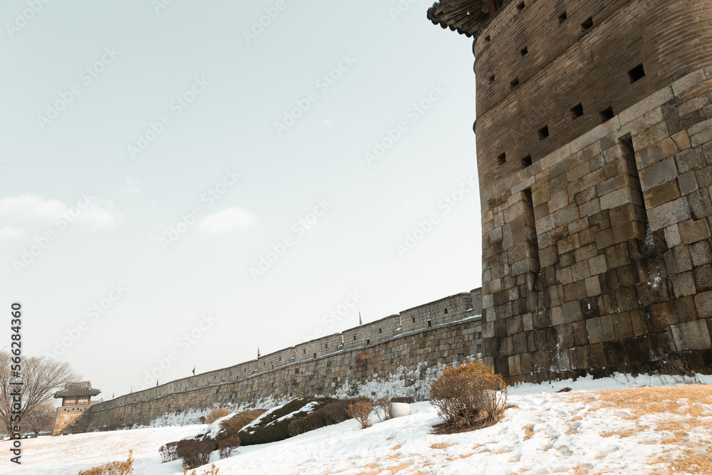 Poster winter of hwaseong fortress with snow in suwon, korea