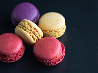 mini macaron different colour in a dark background