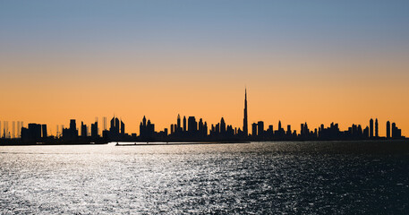 Dubai skyline at sunset. Dubai is the fastest growing city in the world.