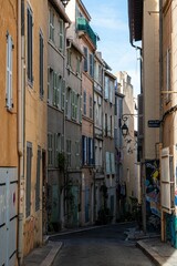 Fototapeta na wymiar Marseille, Provence, France - Facades of houses in a narrow street in old town