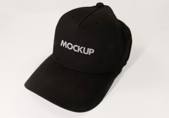 Black Hat Mockup with Photo Realistic Fabric Texture on a Clean White Background
