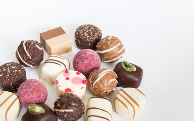 Chocolate pralines truffles with space.