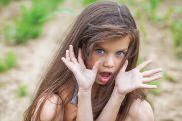 Fototapeta premium Close up portrait of a little girl before school age
