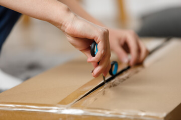 Unpacking the box with online purchase, delivery of the package to the consumer.