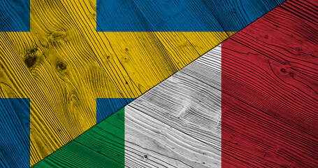 Background with flag of Sweden and Italy on wooden split table. 3d illustration