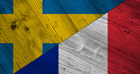 Background with flag of Sweden and France on wooden split board. 3d illustration