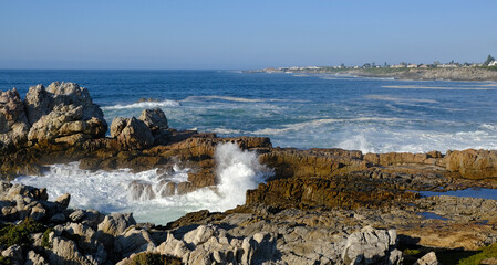 Breaking waves and coastline at Hermanus, Western Cape, South Africa