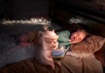 monster reads a book to a baby at night