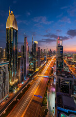 Fototapeta na wymiar Views across Sheikh Zayed Road in from Level 43 at the Sheraton Four Points in Dubai during Blue Hour