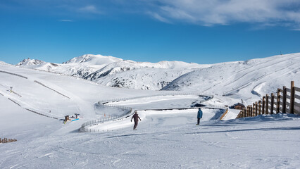 Panoramic view of the snowy slopes at the top of the ski resort of Grandvalira, Pyrenees, Andorra.
