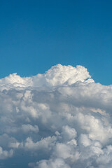White clouds and blue sky in this aerial photograph of clouds