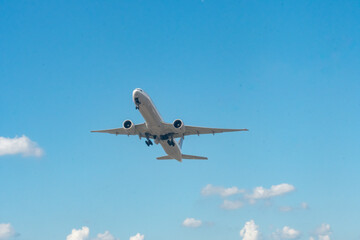 Fototapeta na wymiar Newark, New Jersey, USA: A commercial passenger jet lands at Newark Liberty International Airport.