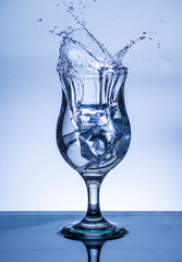 The image of pouring drinking water, into a glass,