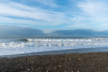waves on the beach with sky
