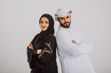 Happy couple from Dubai. Man and woman wearing traditional clothes from the uae