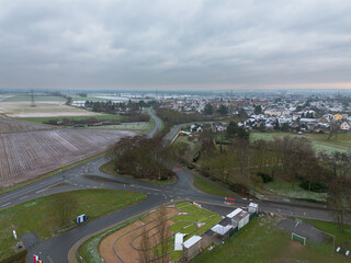 View over Weiterstadt Braunshardt on a cloudy, winter day with light snow