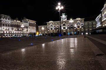 Piazza Unità d'Italia in Trieste, Italy. Perspective at night with lights in long exposure. Soft and architectural.