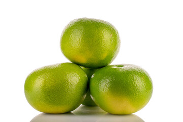 Several natural organic Citrus Sweetie, close-up, isolated on white.