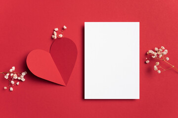 Blank Valentines Day greeting card mockup on red background