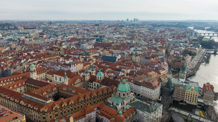 Fototapeta na wymiar Aerial view of River and buildings in Old Town of Prague, Czech Republic. Drone photo high angle view of City