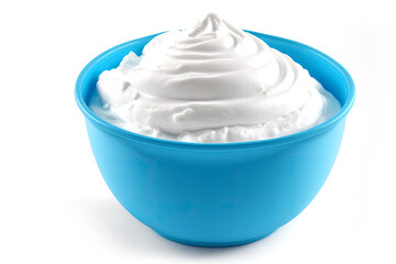 Fresh greek yogurt in a blue bowl isolated on white background