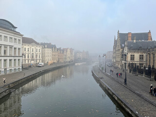 Scenic view of the Leie canal in Ghent (Belgium) in the morning mist