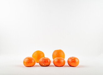 Fresh ripe mandarin and orange on white background isolated.	
