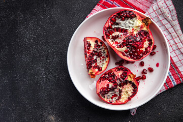 pomegranate fruit fresh red sweet berry healthy meal food snack on the table copy space food background rustic top view