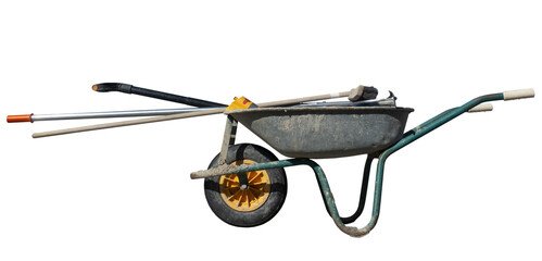 Dirty  wheelbarrow with tools