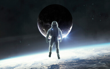 3D illustration of astronaut flying in space. 5K realistic science fiction art. Elements of image provided by Nasa © Vadimsadovski