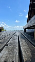 Obraz premium wooden bridge over the sea