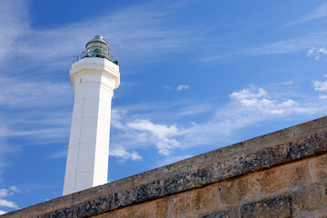 Santa Maria di Leuca, Puglia, Italy. The lighthouse is located on the hill overlooking the bay. 