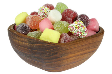Dutch tum tum candies in a teakwood bowl isolated on white background