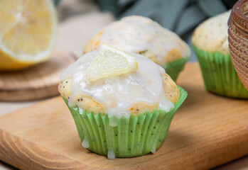 Lemon clip with poppy seeds on a beige background