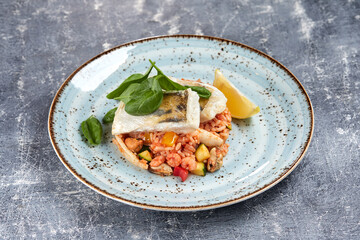 white fish with rice and vegetables