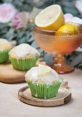Lemon clip with poppy seeds on a beige background