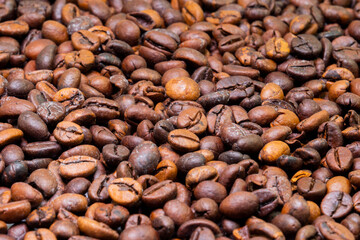 Background of roasted coffee beans (close-up). Coffee shop concept