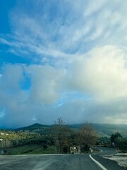 Driving empty highway in the mountains landscape