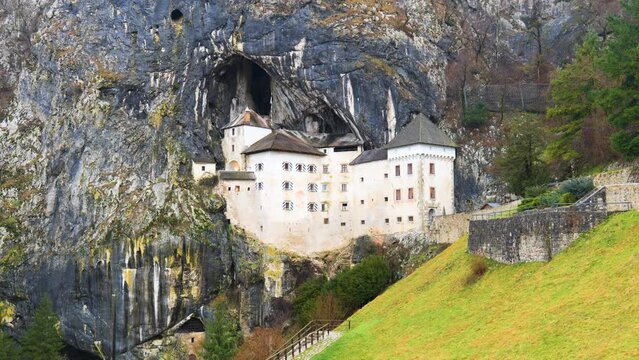 View of the Predjama Castle in Slovenia. Places of historic interest. The impregnable medieval marvel has been perched in the middle of a 123 meter high cliff for more than 800 years. 