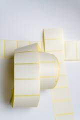 Rolls of white labels isolated. Labels for direct thermal or thermal transfer printing. Blank...