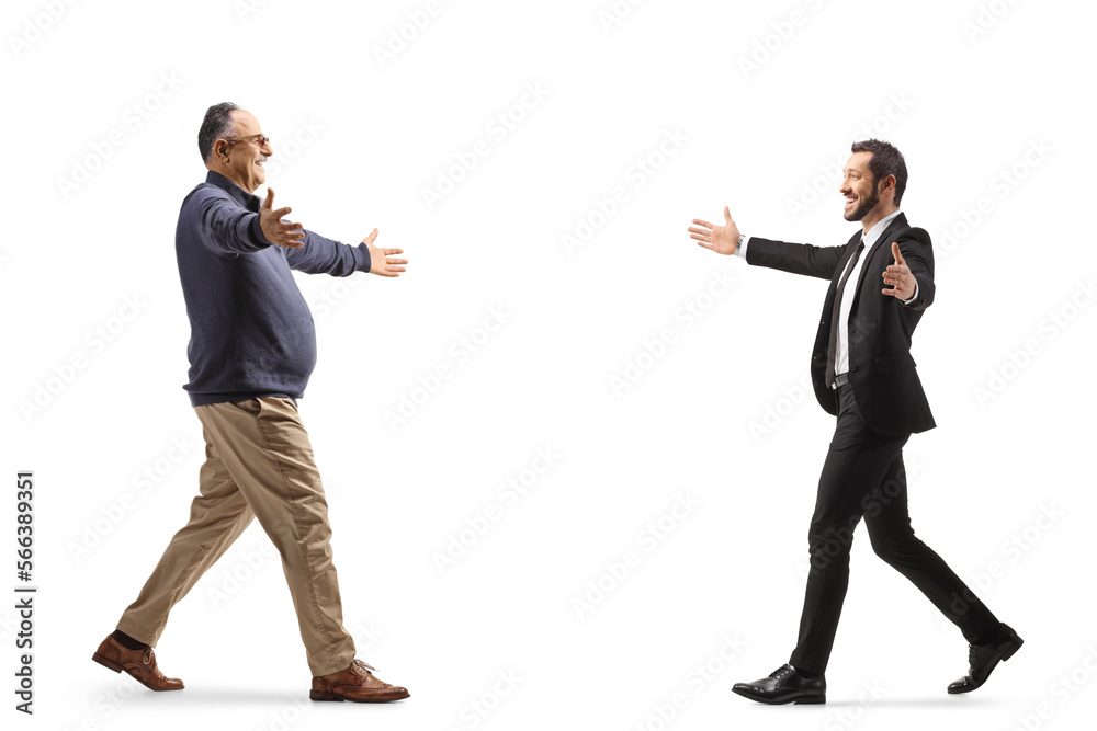 Sticker Full length profile shot of a young busniessman walking to hug a mature man with arms wide open