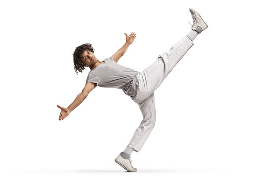 African american young male dancer with leg up