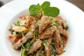 Caesar Salad in a bowl on table,