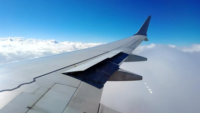 Airplane Window View In The Clouds