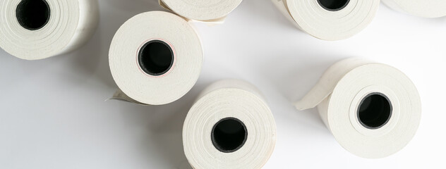 Rolls of white labels isolated. Labels for direct thermal or thermal transfer printing. Blank...